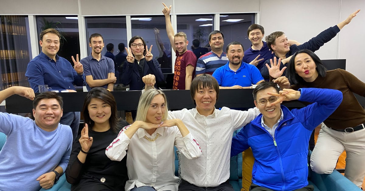 Farel team posed together in the office, celebrating the launch of the company