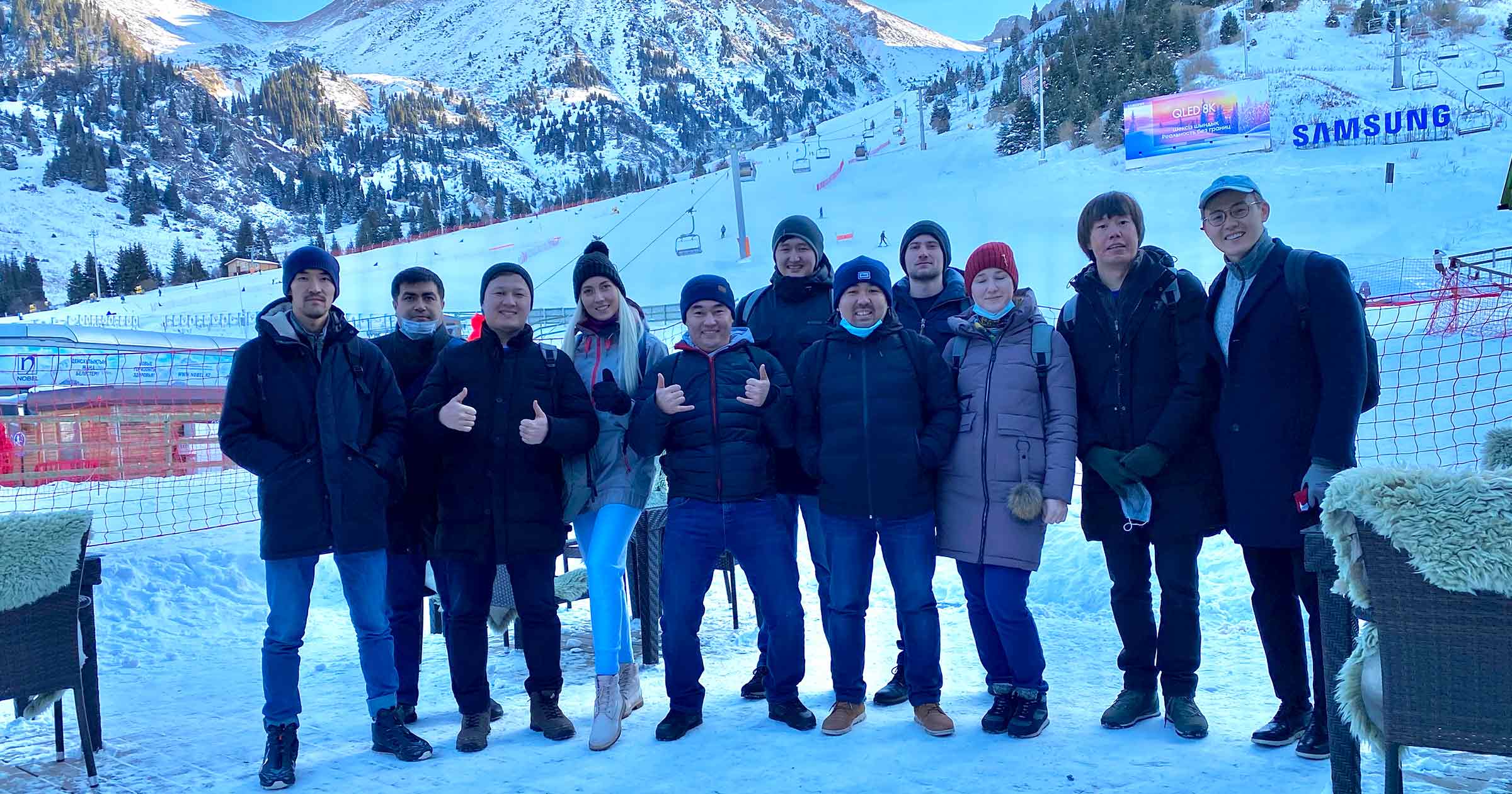 Farel team posing together at the ski resort near Almaty during the POC trip