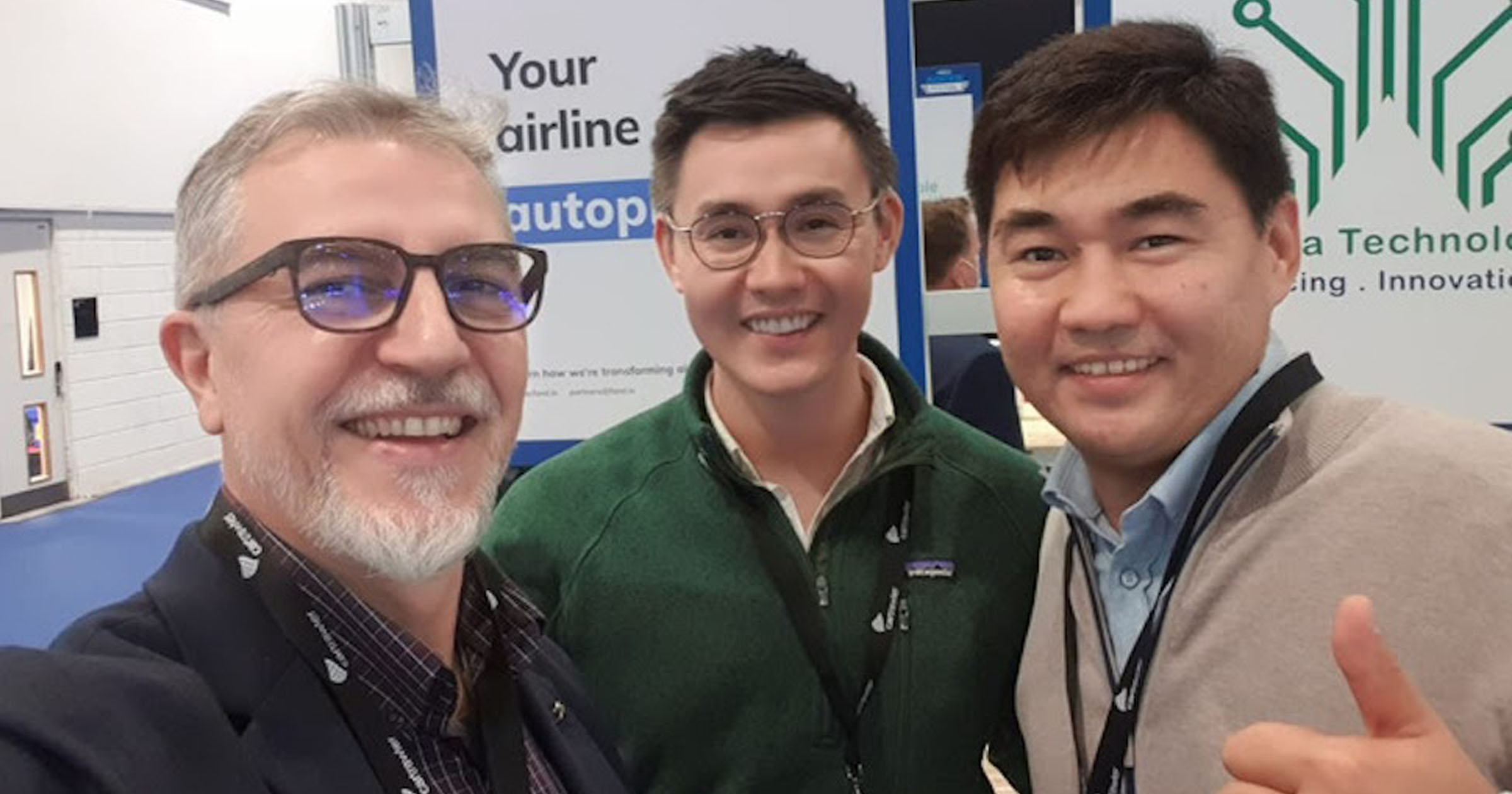 Selfie of the Farel team meeting industry colleagues at the World Aviation Festival booth